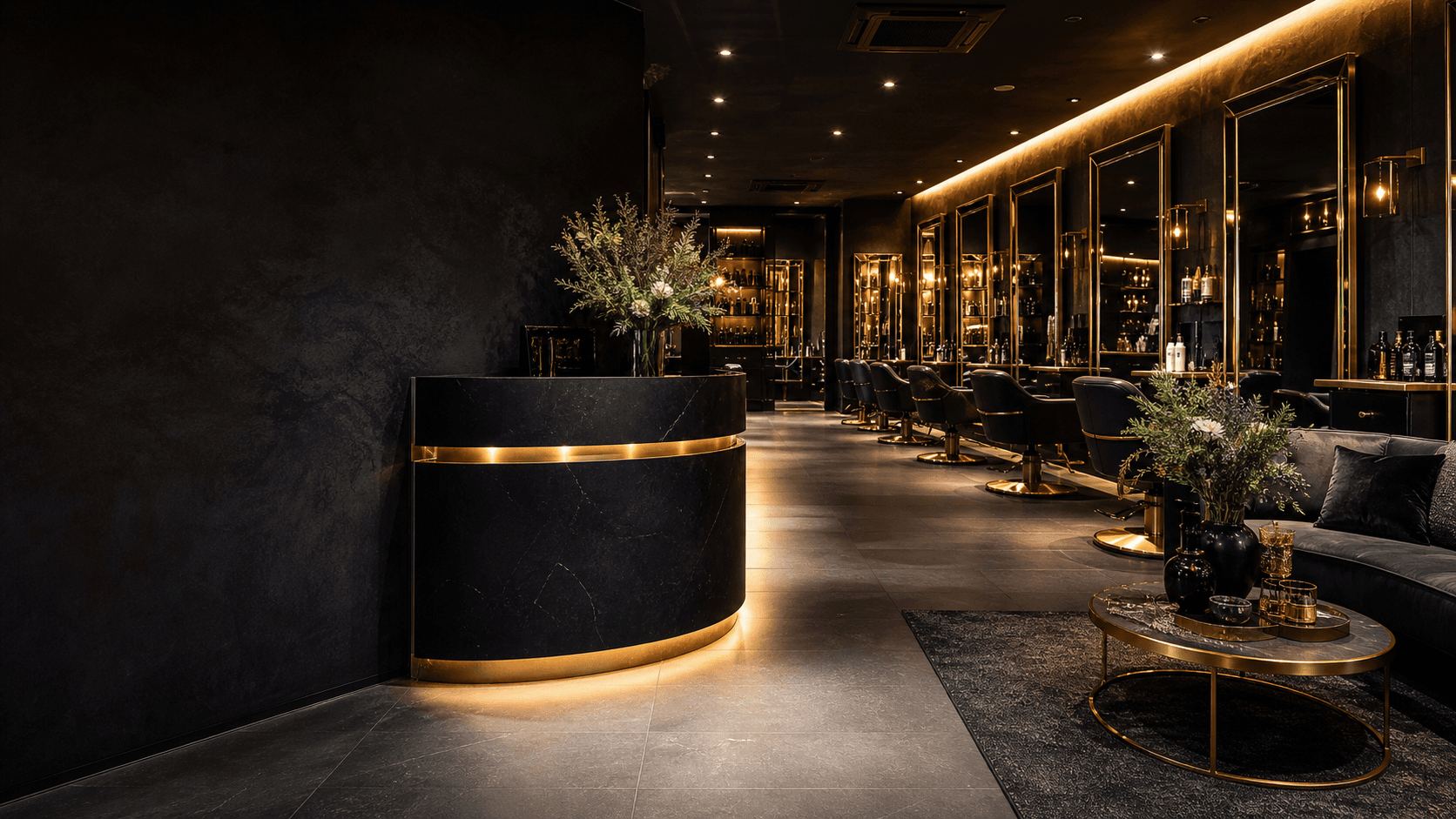Black and gold interior of STYLEHVN luxury unisex salon in Yelahanka