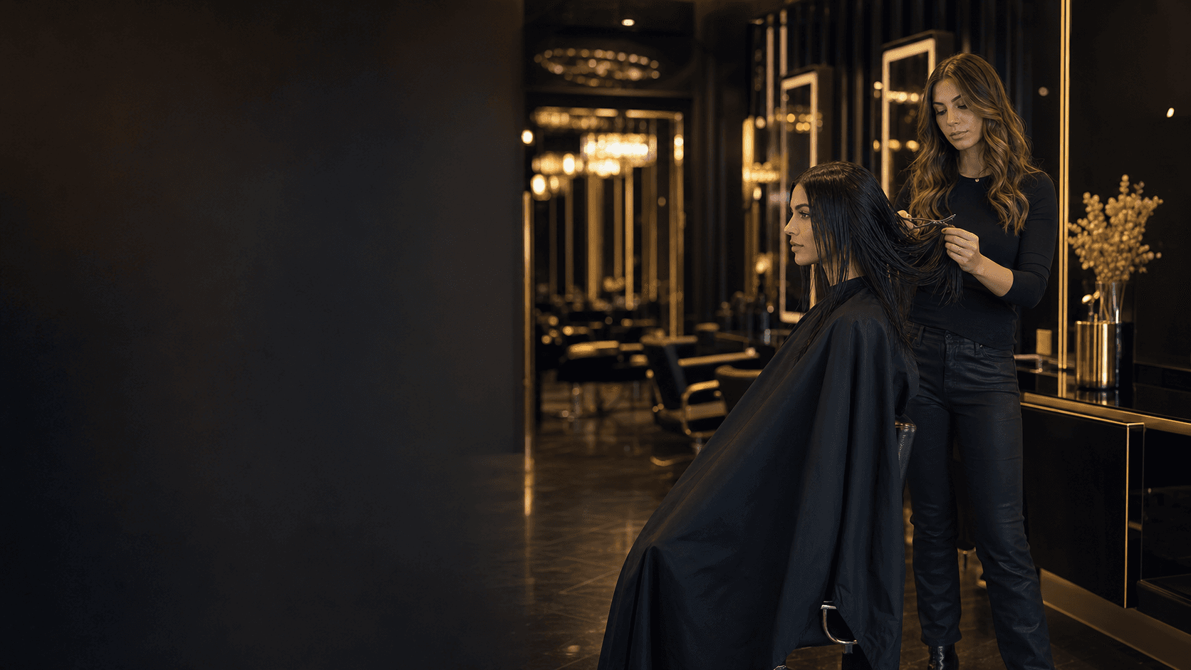 Woman receiving a precision haircut at STYLEHVN Unisex Salon